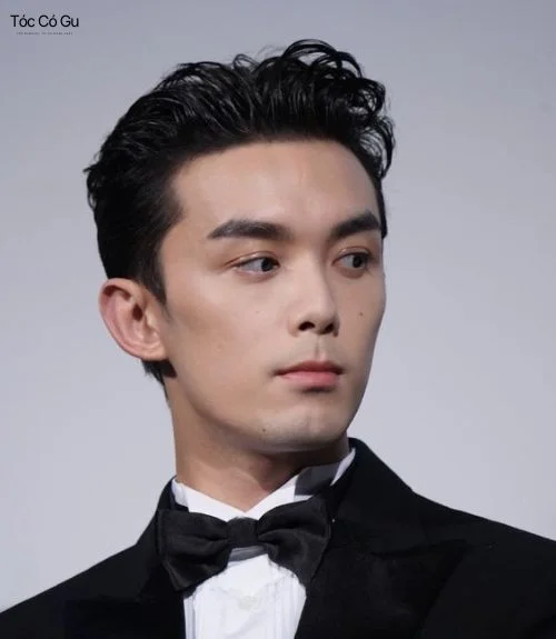 Top 7 kiểu tóc mặc vest nam đẹp chuẩn quý ông Kiểu tóc Pompadour phối suit mang đến phong thái tự tin và cuốn hút