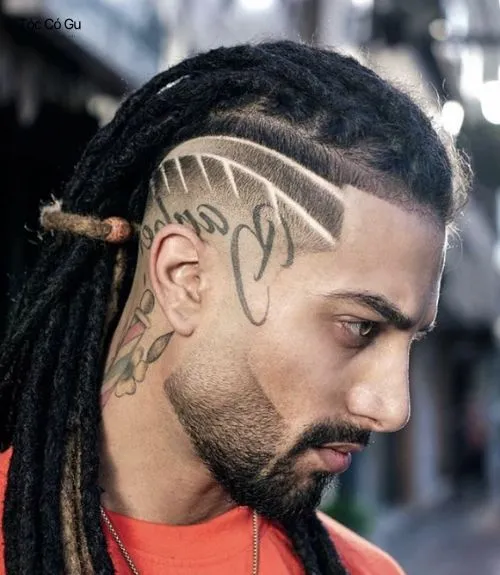 25+ kiểu kẻ tóc nam đẹp, chất và nghệ thuật được yêu thích nhất Tattoo tóc nam dreadlock với đường line vòng cung quanh tai.