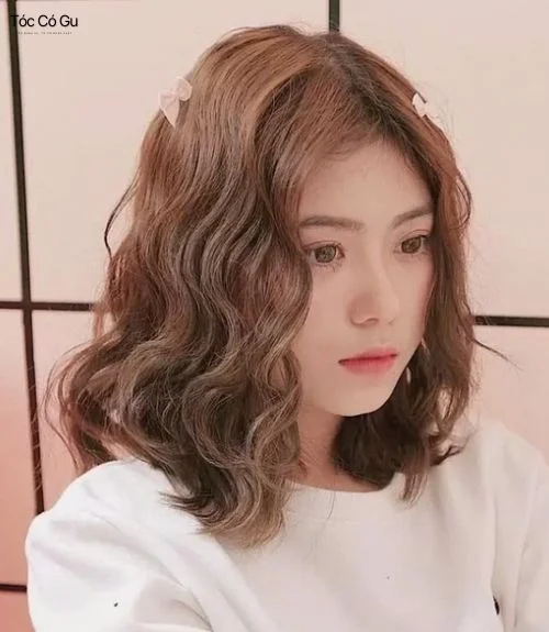 Nữ tóc dày nên để kiểu gì? 12 kiểu tóc đẹp, hot trend nhất Tóc lob uốn nhẹ mang vẻ đẹp thanh lịch tự nhiên