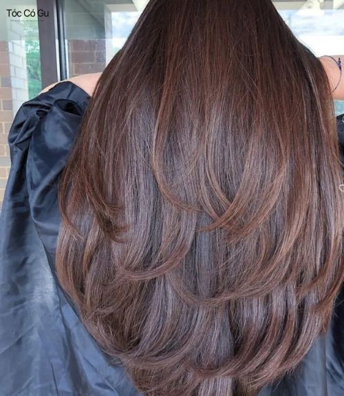 15+ Kiểu tóc uốn đuôi trẻ trung, bồng bềnh, hợp mọi dáng mặt Tóc xoăn đuôi tầng