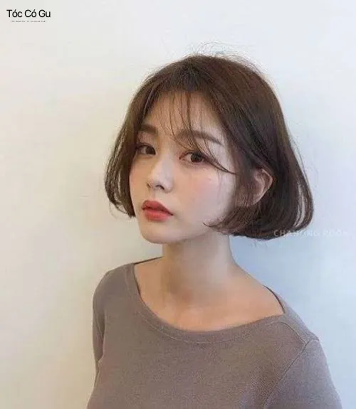 10 kiểu tóc uốn ngắn đẹp trẻ trung giúp diện mạo thêm cuốn hút Tóc ngắn uốn cụp thanh lịch với phần đuôi ôm nhẹ khuôn mặt